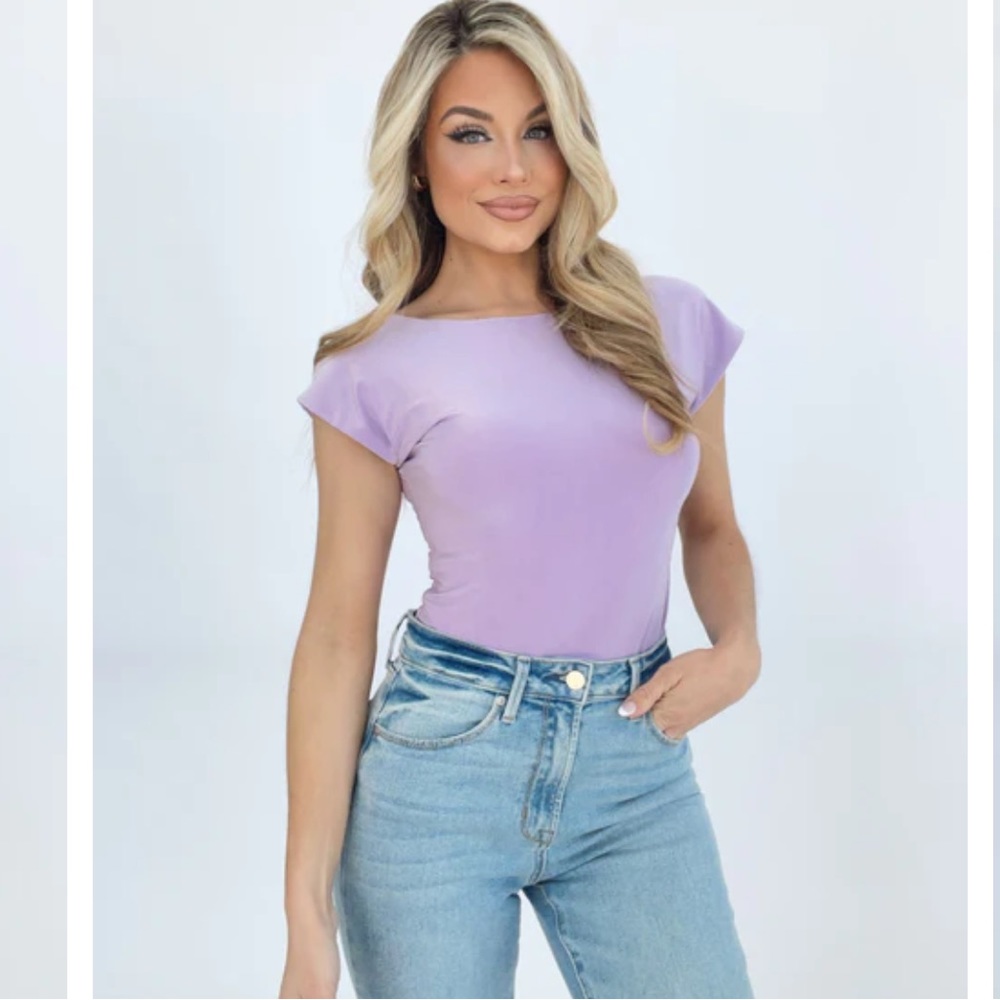 Smooth sheen body suit never worn